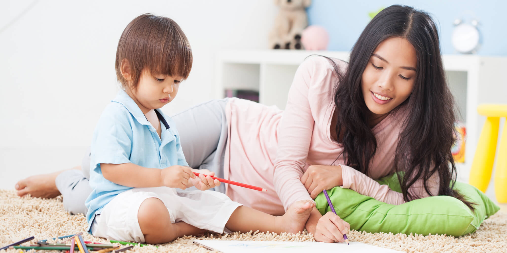 A mother playing with her son