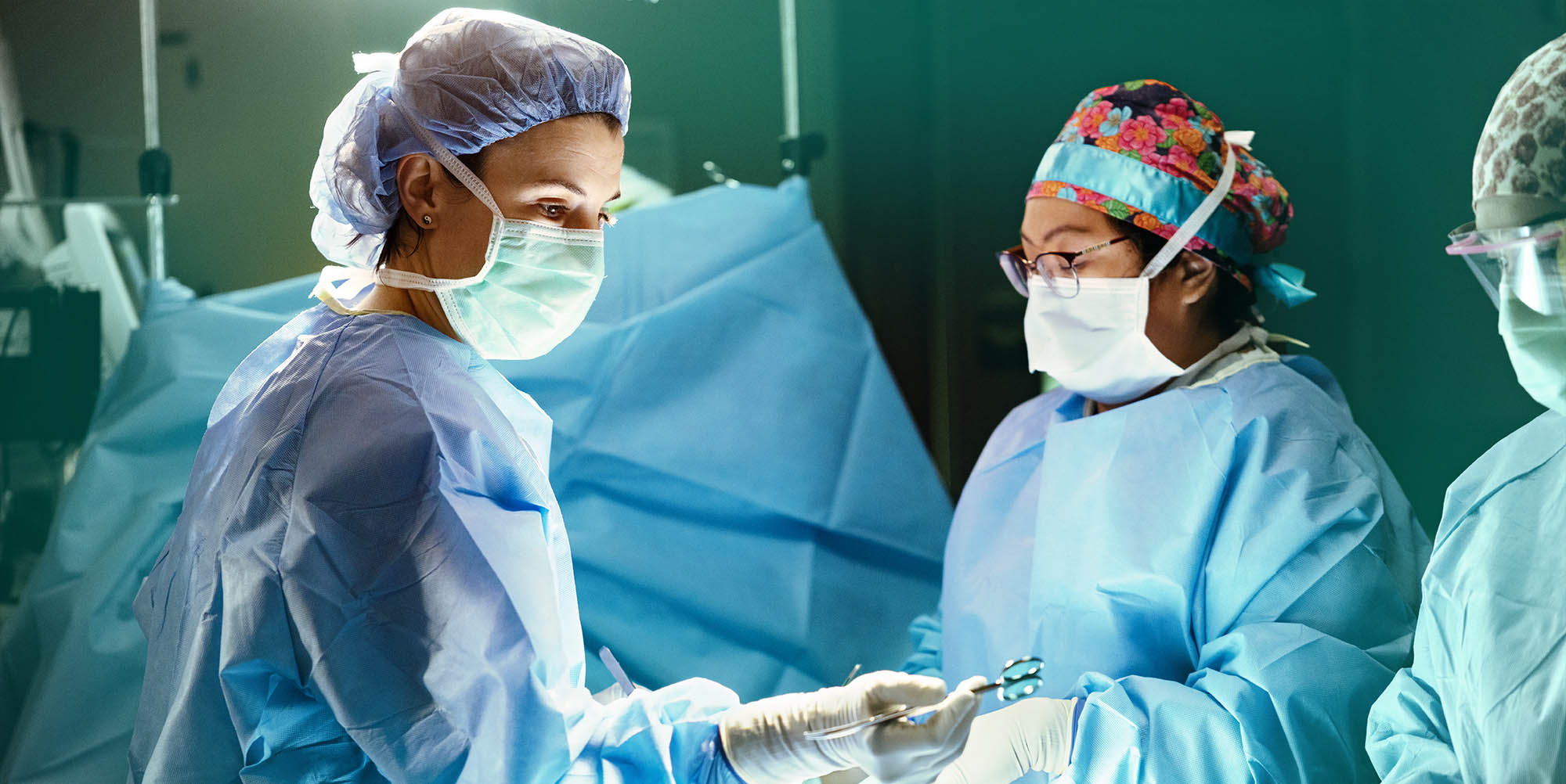 Surgeons performing transplant surgery