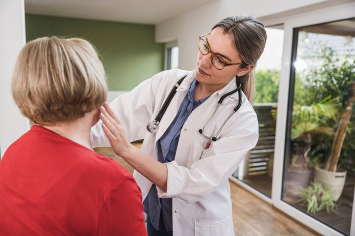 Doctor examining patient