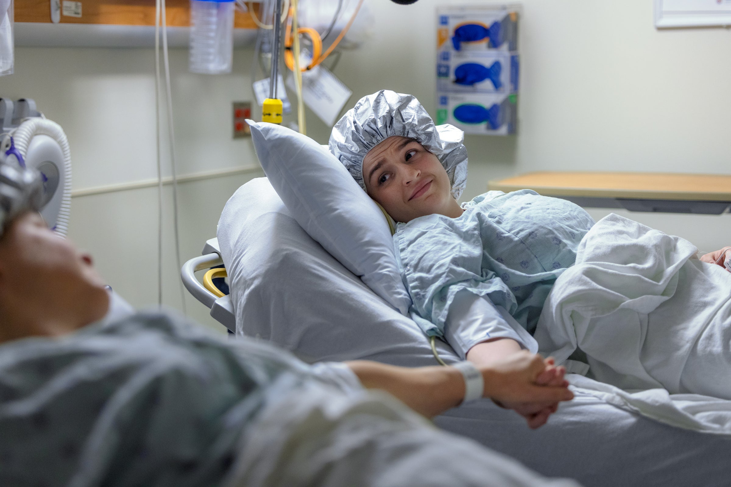 Patient in a medical bed after surgery