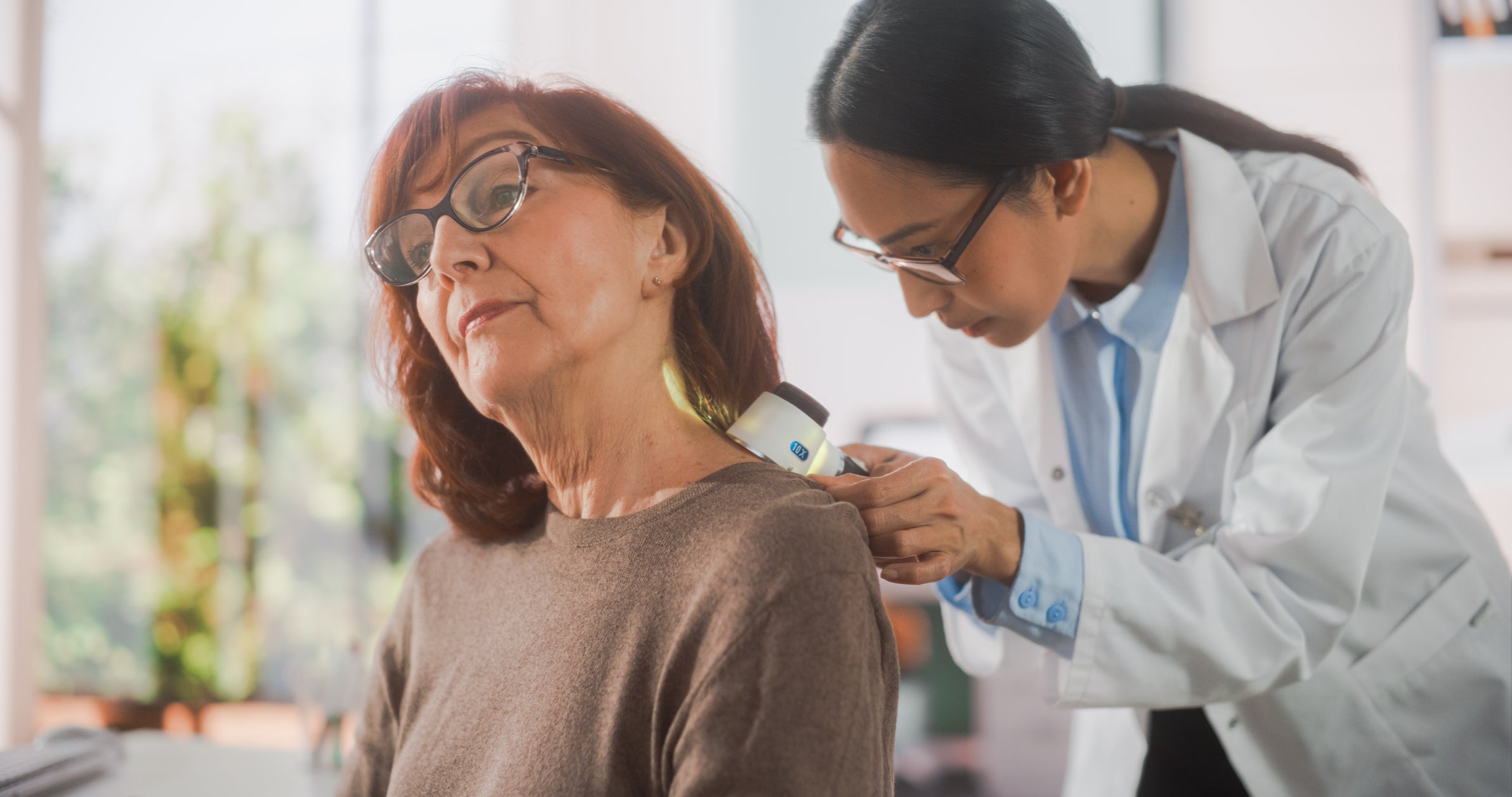 Woman being examined by her physician