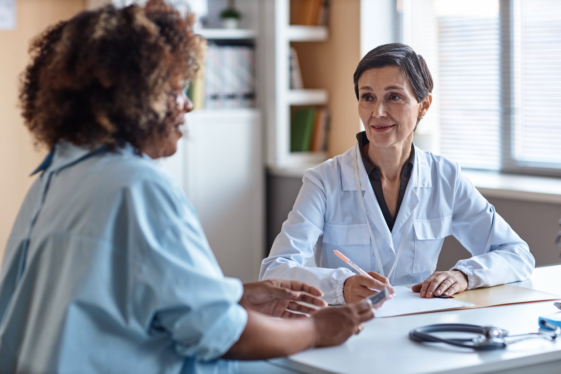 Patient speaking with physician