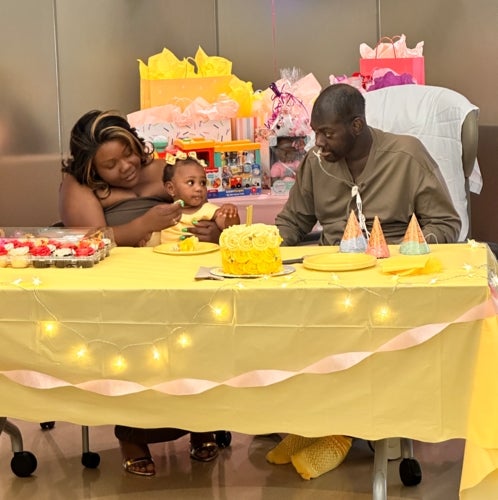 The couple’s daughter enjoyed her cake. 