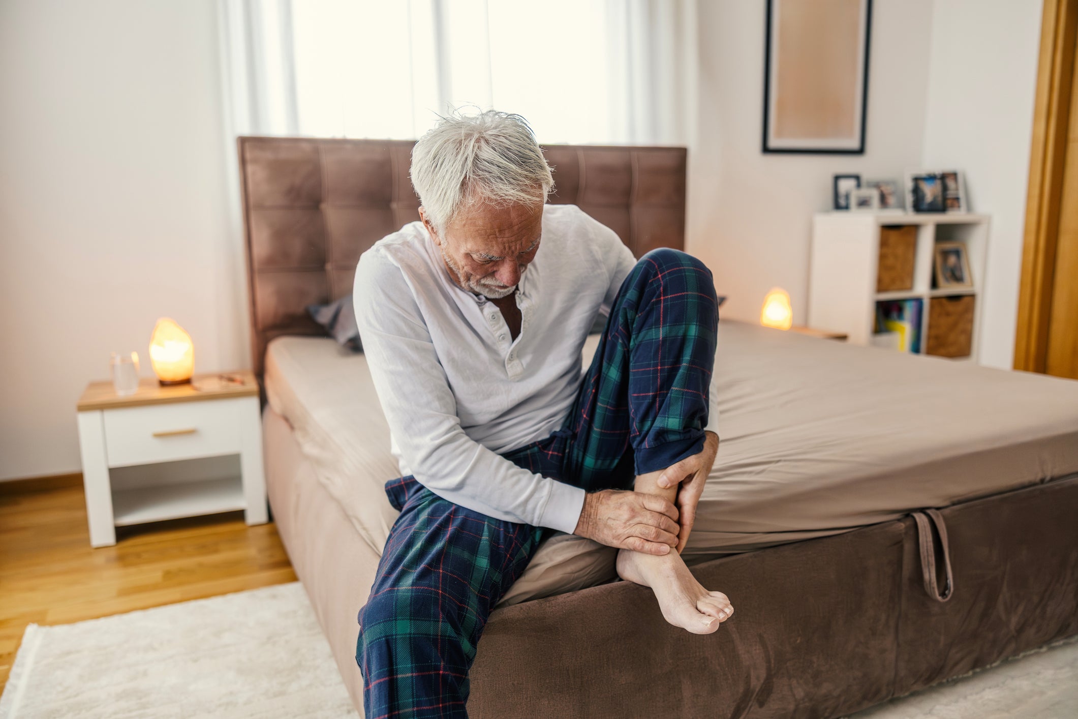 Woman experiencing pain in her foot