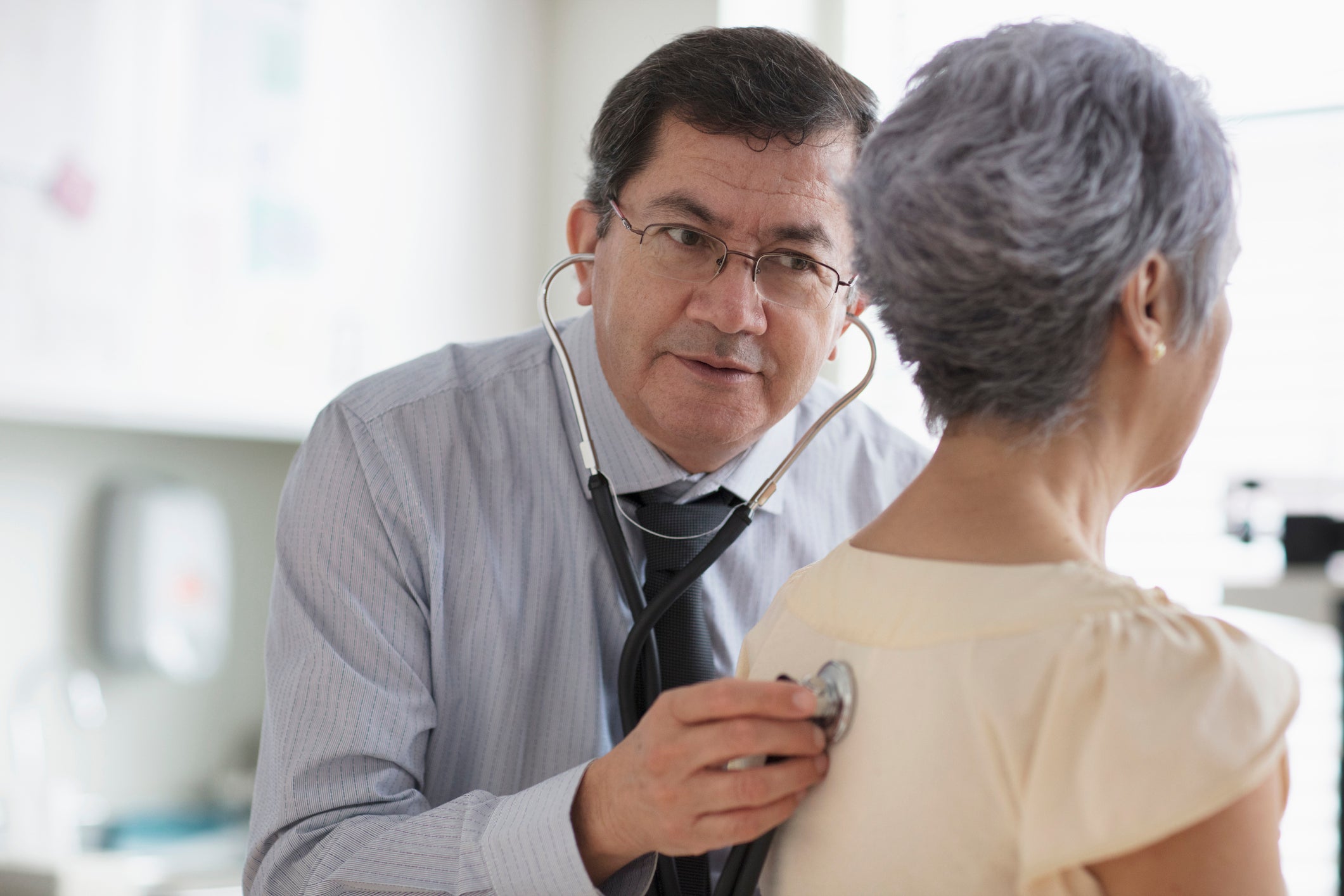 Doctor examning a patient with a stethoscope