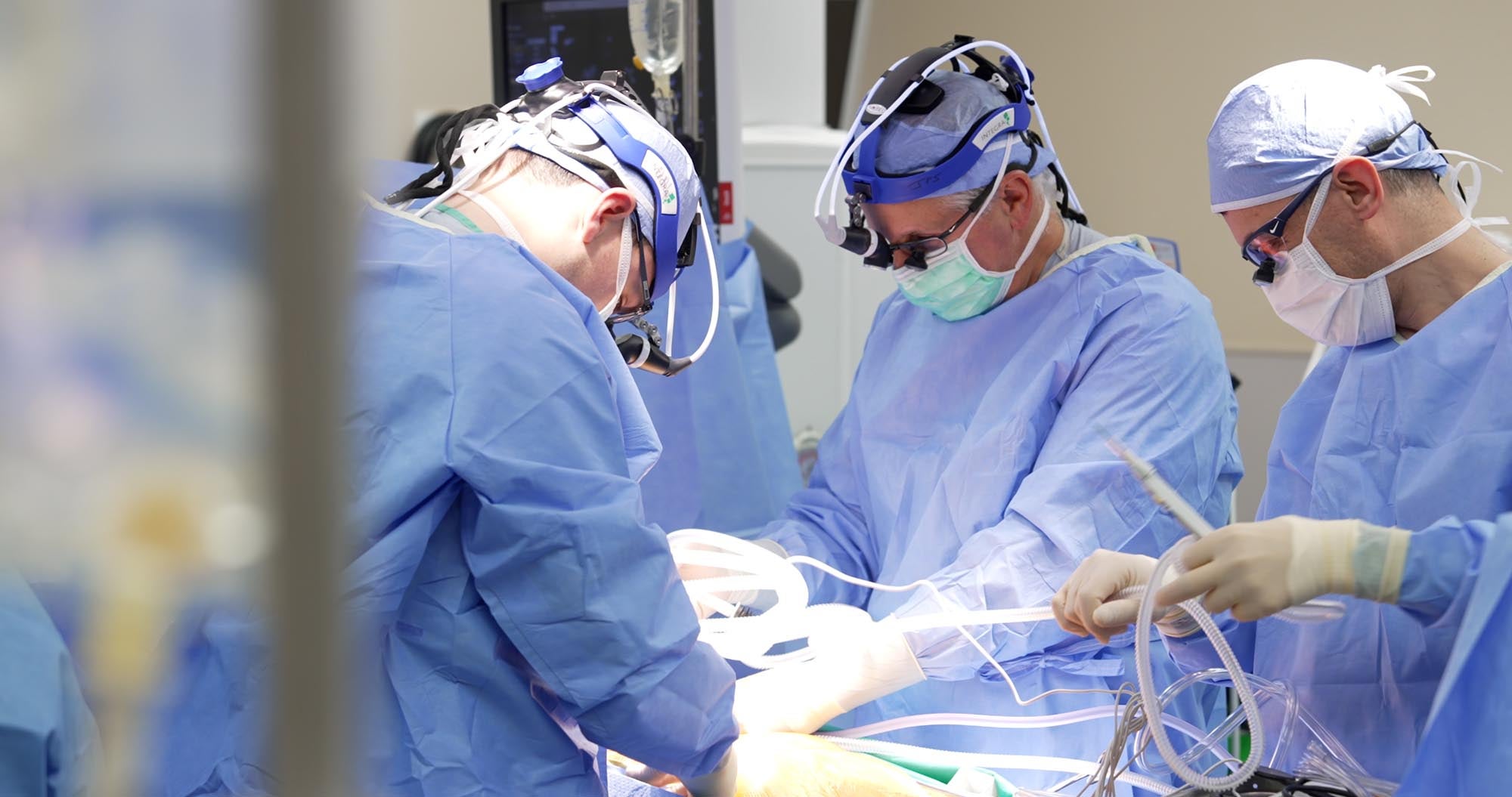 Cardiac doctors performing surgery