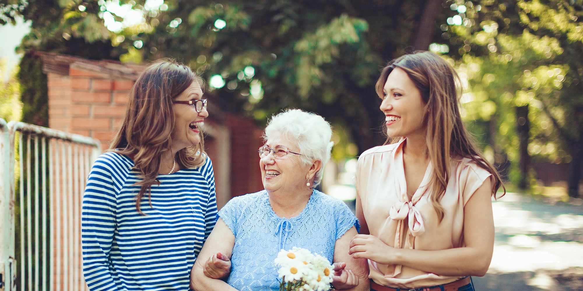Three happy women outdoors