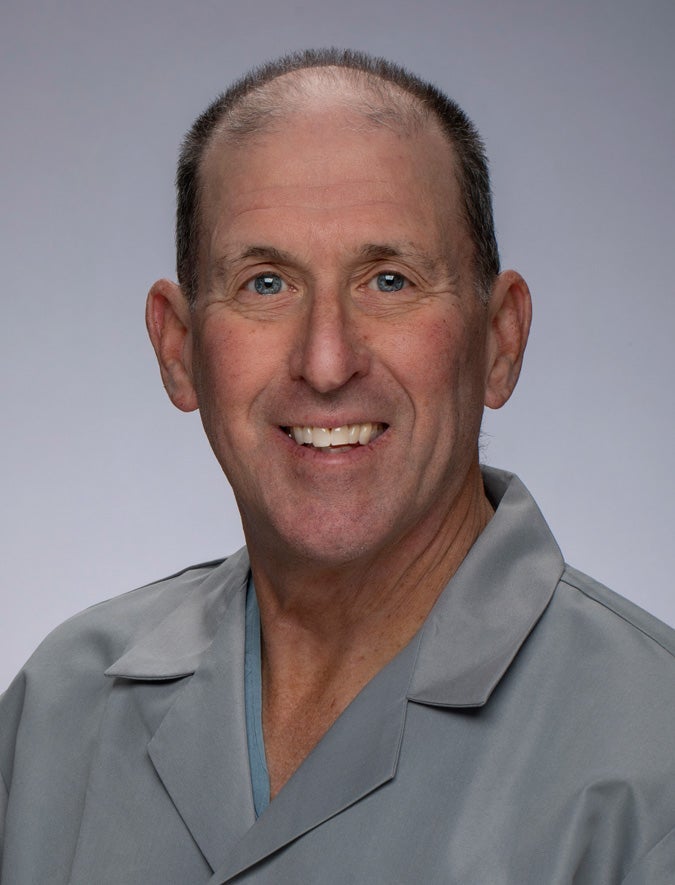 Eric R Sloan, MD