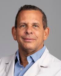 John A Mitchell, MD