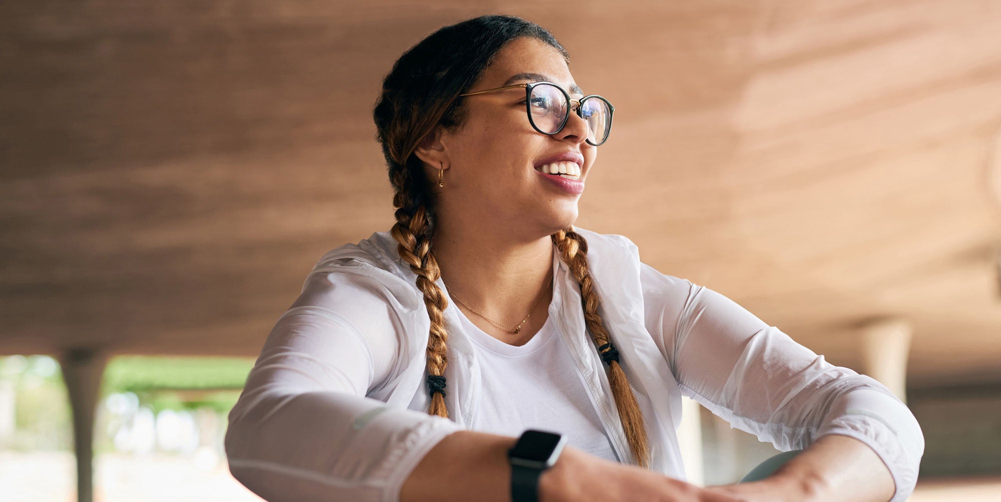 Woman smiling and sitting in a room