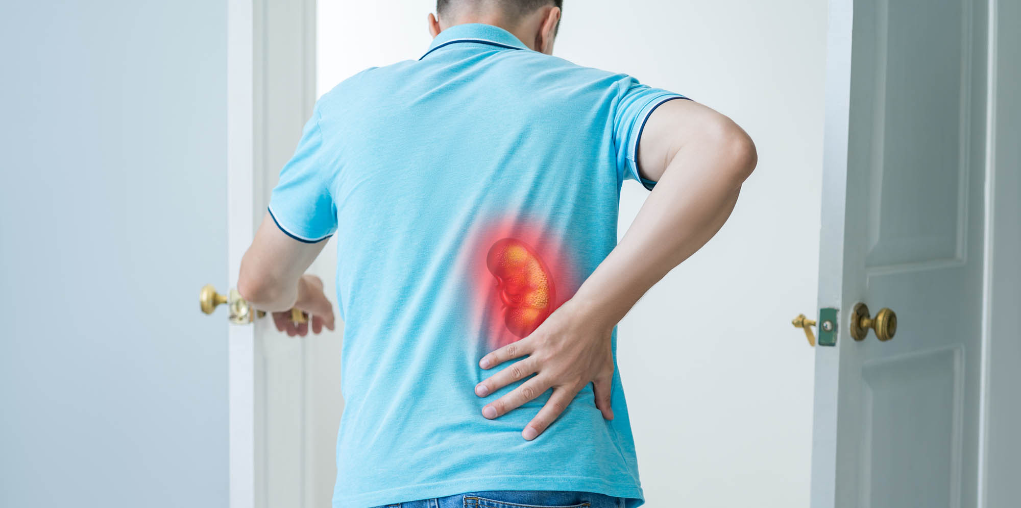 Man holding his back