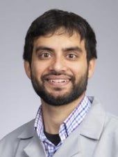 Umar M Kamal, MD