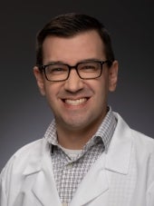 Andrew M Burns, MD