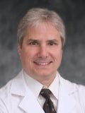 Ronald E Stella, MD