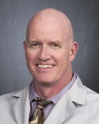 Dennis M Moore